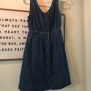 Denim short dress with open back.